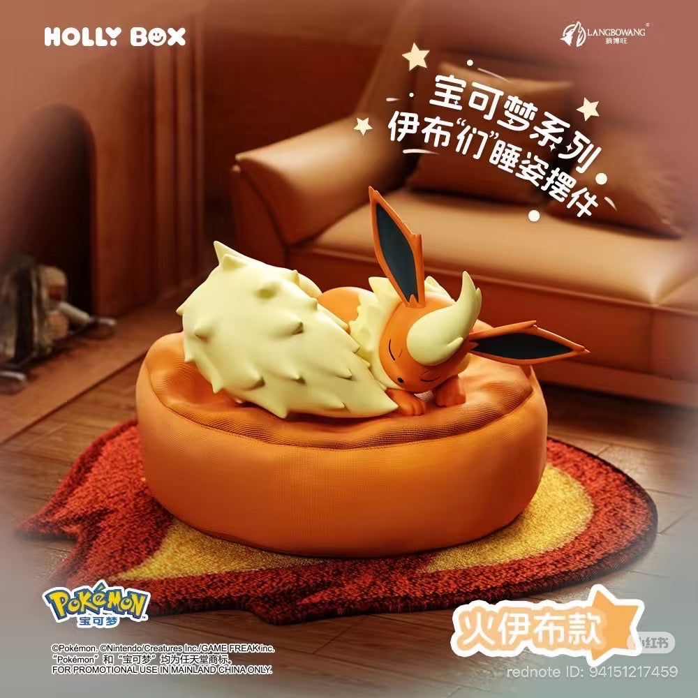 HOLLY BOX sleeping Flareon figure on its cushion