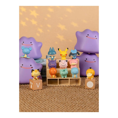 A shelf of Happy Ditto mini figures — Ditto's smiley face on every Pokémon