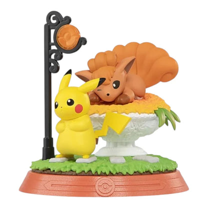 Pikachu and Vulpix figure from the Funism Pikachu and Friends series, under a street lamp in autumn leaves