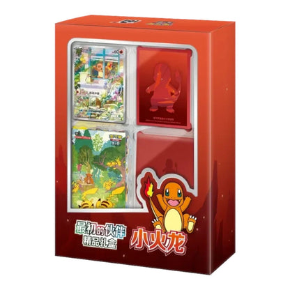 Charmander Pokémon trading card gift set in a red display box with themed card sleeves and game cards