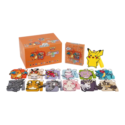 Pokémon silicone card holders with character keychains, wrist straps and display boxes laid out