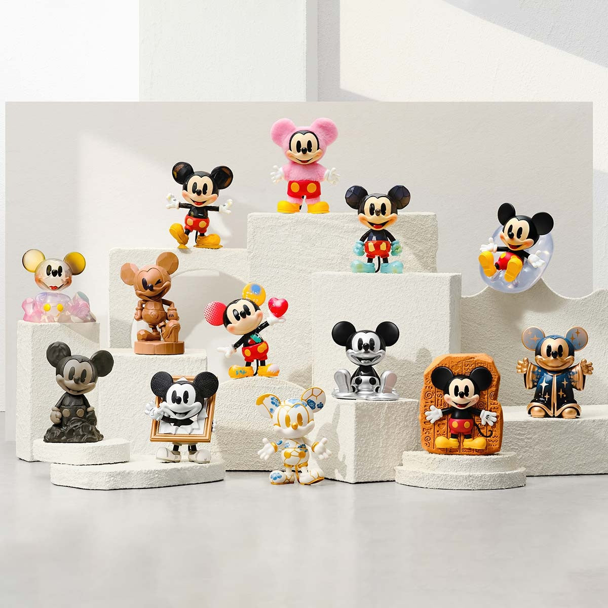 The thirteen regular Mickey designs in the POP MART Boundless Creativity Series